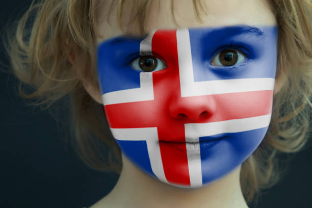 istock Child with a painted flag of Iceland 948824590