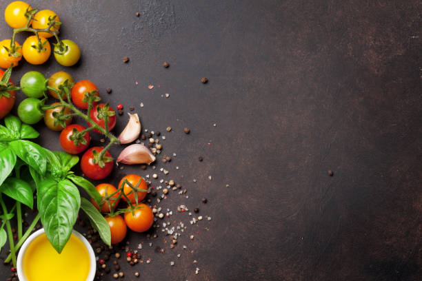 istock Tomatoes, basil, olive oil and spices 948824716