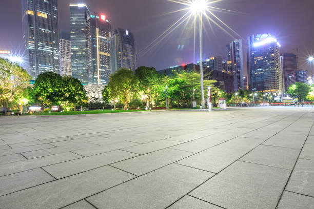istock empty square floor and modern city landscape at night 948825690