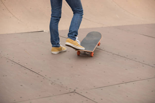 istock Skateboarder sakteboarding on skatepark 948829680