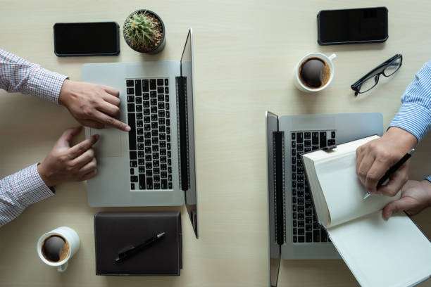istock Overhead View top view man Working Desk Concept 948833796