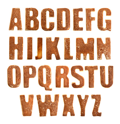 Homemade cookie letter alphabet on white background. Isolated.