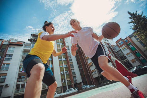 istock Girls playing basketball 948843220