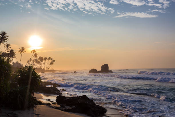 istock Tropical sunset and scenic beach 948857456