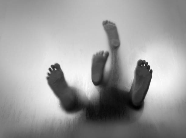 Human feet walking on frosted glass