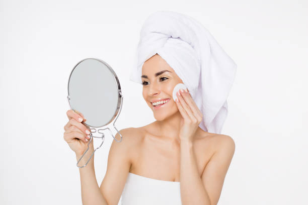 istock Beauty Woman Removing makeup. 948878942