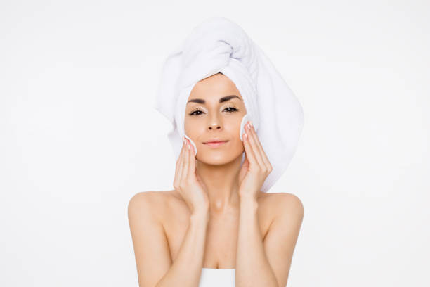 istock Beauty Woman Removing makeup. 948878980