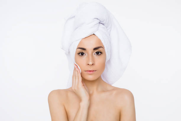 istock Beauty Woman Removing makeup. 948878992