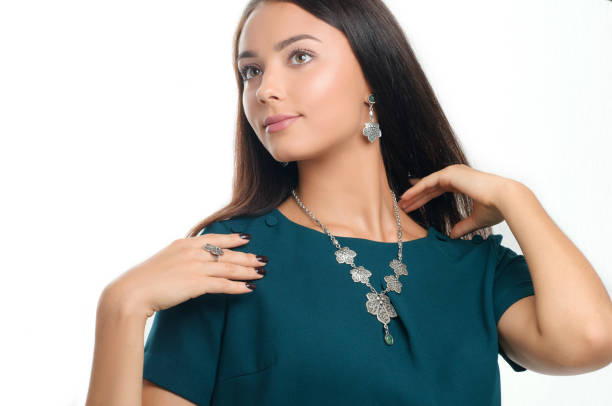 istock european style model wearing luxury accessory from silver. Isolated on white background 948882772