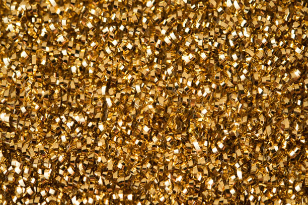 istock Golden yellow glitter surface. Background for holidays, christmas or celebration. 948886782
