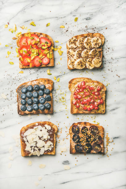 istock Vegan toasts with fruit, seeds, nuts and peanut butter 948890340