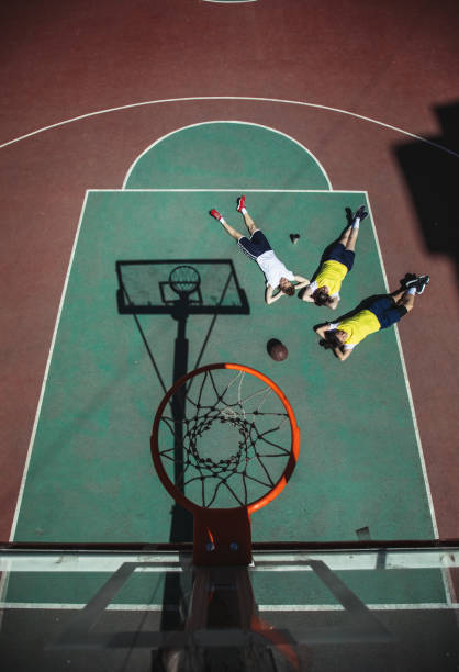 istock Lying on streetball court 948891282