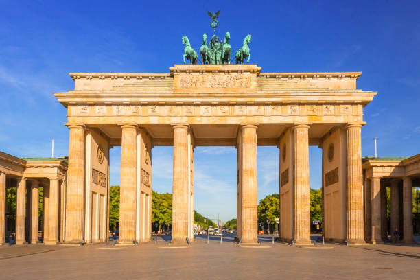 istock The Brandenburg Gate in Berlin at sunrise 948893838
