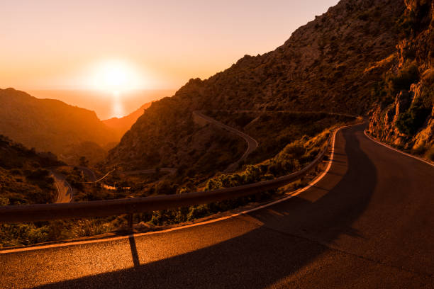 istock Winding road of mountain range at Mallorca at sunset. 948894428