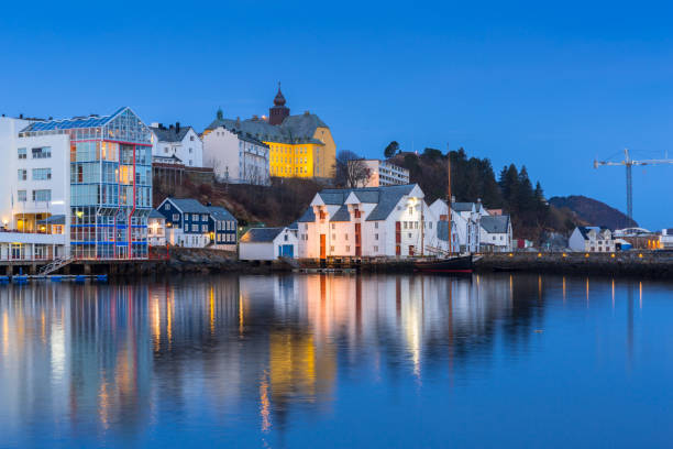 istock Architecture of Alesund town reflected in the water 948896150