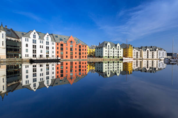 istock Architecture of Alesund town reflected in the water 948898678