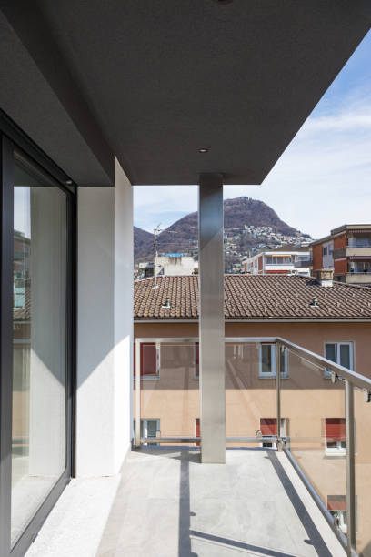 istock Balcony of modern building overlooking city 948898784
