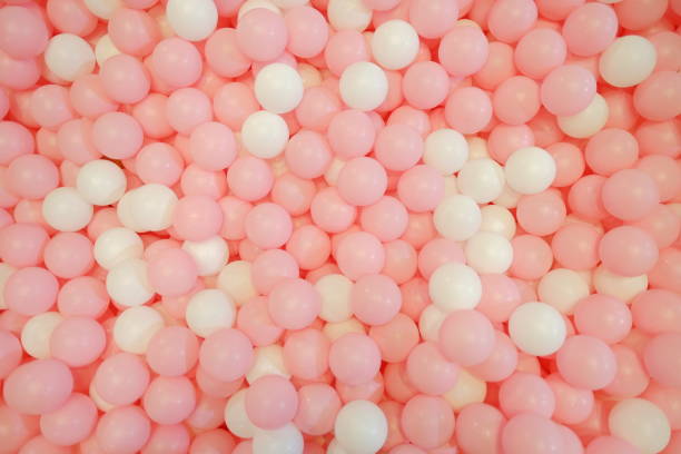 kids ball pit or ball pool with only pink and white ball - ball pool imagens e fotografias de stock