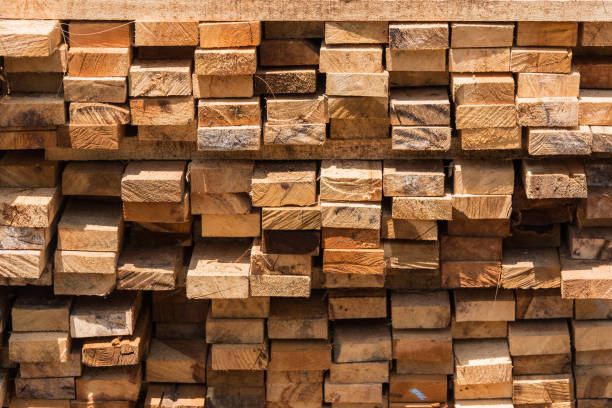 Pile of cut wood for construction ( texture, background, pattern).Thailand