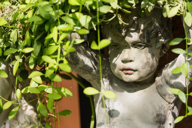 istock Stone statue used to decorate the garden. 948907384
