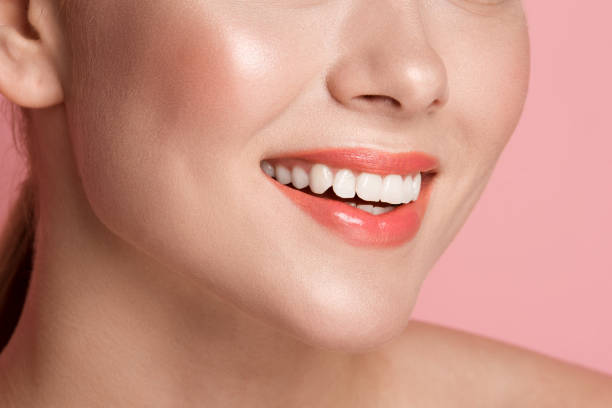 istock Female lower face stretching in smile 948907650