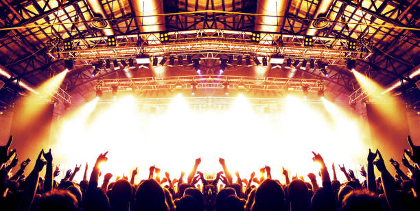 istock Concert arena with fans clapping 948930948
