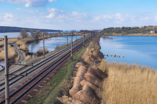 Railroad spring landscape with place where small river Karachokrak flows into Dnipro, Ukraine