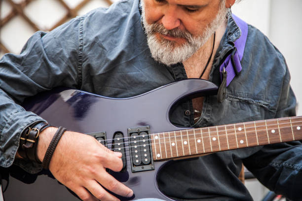 istock Man playing an electric guitar 948948082