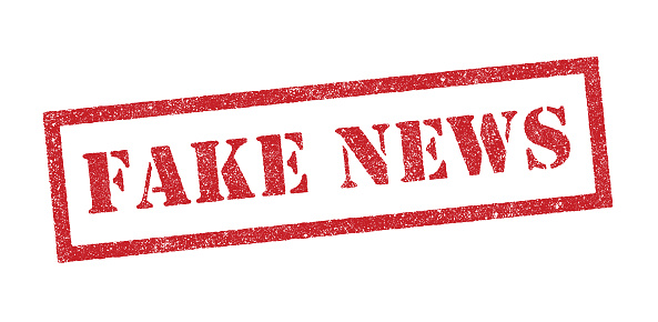 Vector Illustration of the word Fake News in red ink stamp