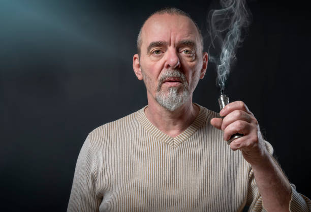 istock portrait of a man with beard who is vaping 948962278