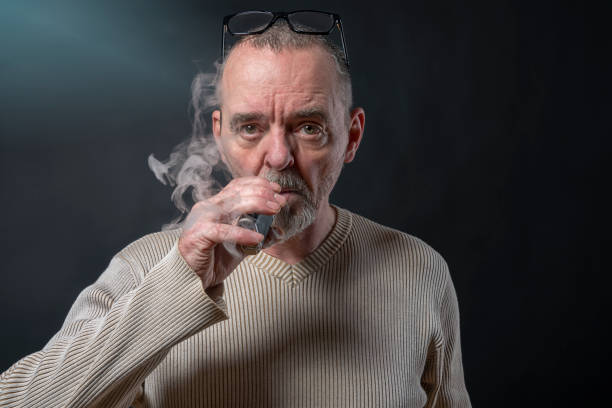 istock portrait of a man with beard who is vaping 948962548