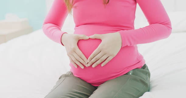 istock close up pregnant women belly 948971984