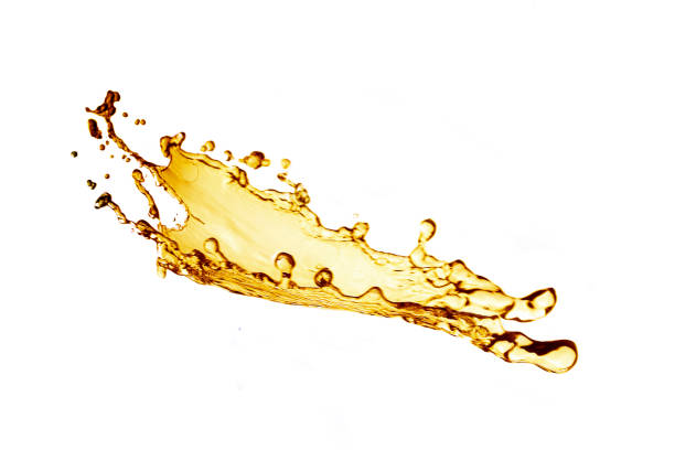 istock Artistic splash of orange juice isolated on white background 948974666