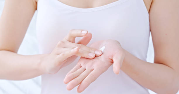istock woman use cream 948979844