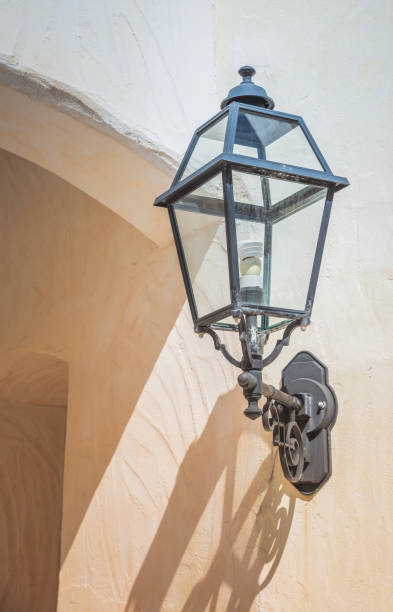 istock old vintage metal light at white wall 948980144