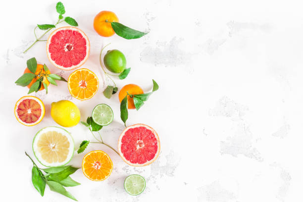 istock Colorful fresh fruits on white table. Flat lay, top view 948980882