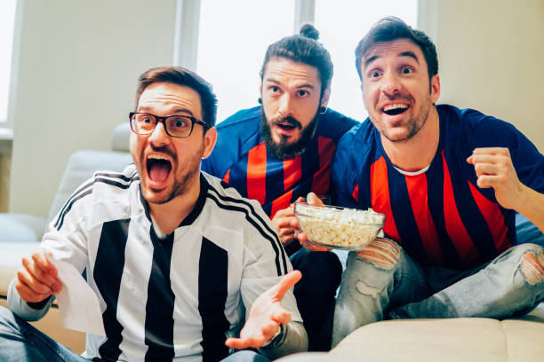 istock Excited football supporters cheering 948987684