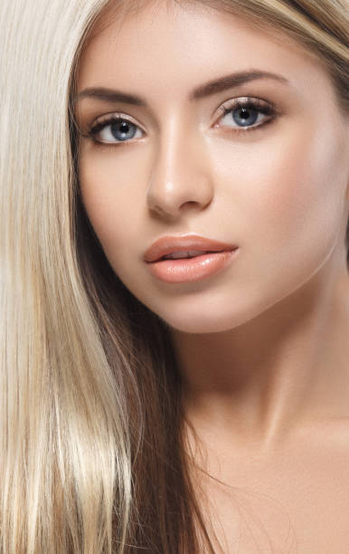 istock Beautiful woman blond portrait face studio 948992462