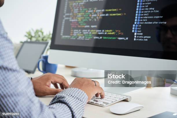 Coding Man Stock Photo - Download Image Now - Computer Programmer, Coding, IT Support