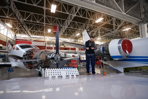 istock Aircraft mechanic in the hangar 948998014