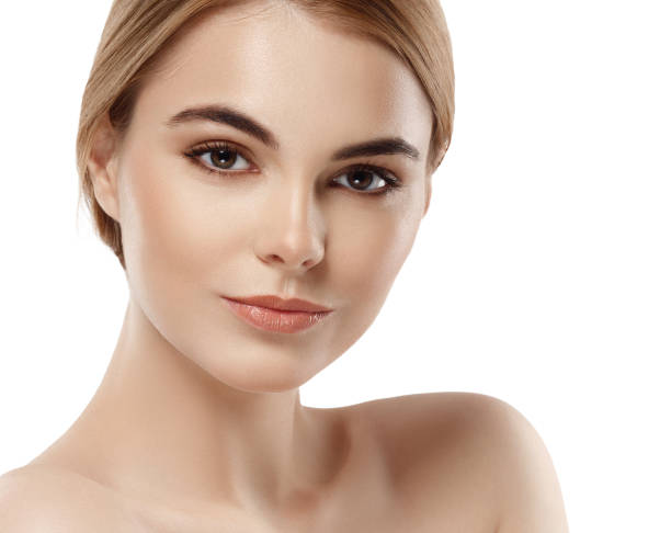 istock Beautiful woman face close up portrait young studio on white 948998564