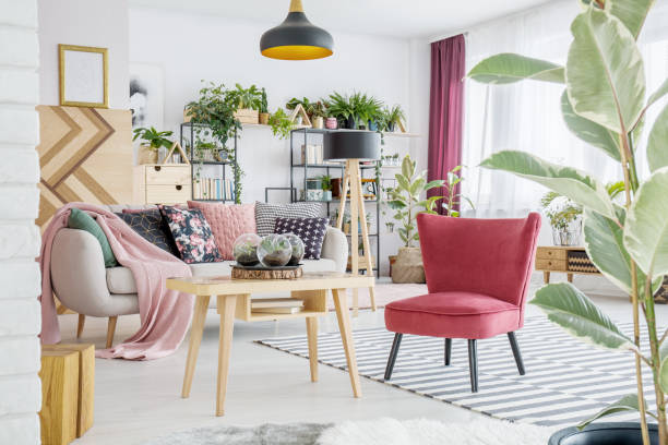 istock Red armchair by the table 948999742