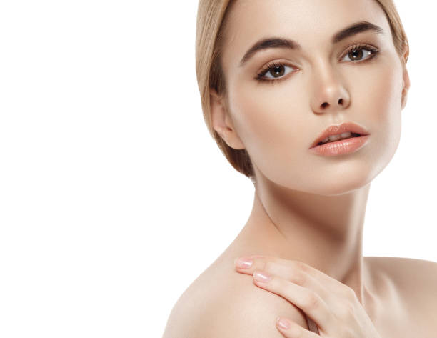 istock Beautiful woman face close up portrait young studio on white 949004740