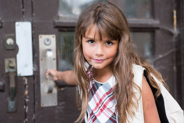 istock eight years old school girl 949025432