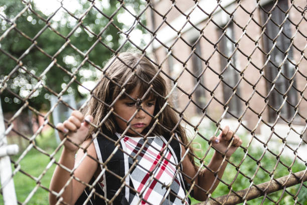 istock eight years old school girl 949025908