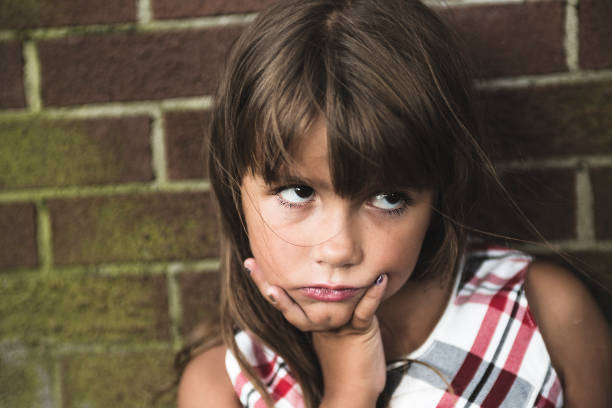 istock eight years old school girl 949031514