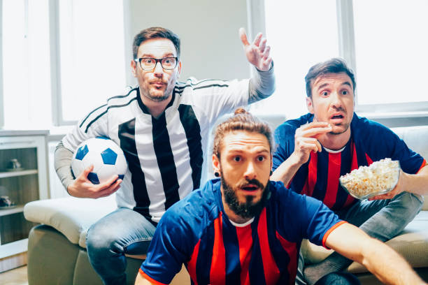 istock Irritated male football supporters 949032192