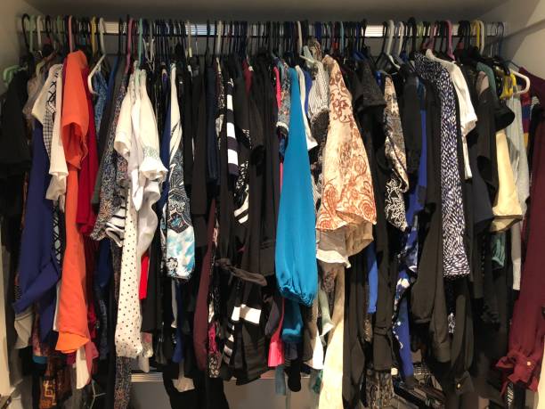 istock Overflowing ladies clothes 949033360