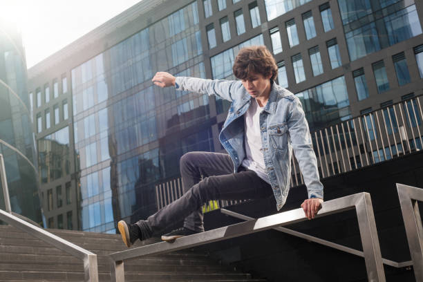 istock Young man doing parkour in the city 949033372