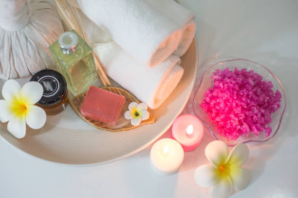istock Beautiful composition of spa treatment on white wooden table 949036462